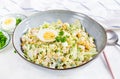 Festive salad with ham, cucumber, boiled eggs, sweet corn and mayonnaise Royalty Free Stock Photo