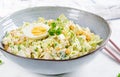 Festive salad with ham, cucumber, boiled eggs, sweet corn and mayonnaise Royalty Free Stock Photo