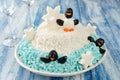 Festive salad penguins on an ice floe Royalty Free Stock Photo