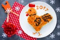 Festive salad shaped rooster or symbol of New Year 2017 on Royalty Free Stock Photo