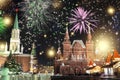 Festive salute and fireworks on the red square in Moscow. Salute lights over the Kremlin and GUM at the New Year celebration Royalty Free Stock Photo