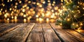 Christmas - Defocused String Light On Rustic Wooden Table In The Night With Abstract Tree And Blurred Background Royalty Free Stock Photo