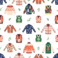 Festive Seamless Pattern With Christmas Sweaters, Adorned With Classic Holiday Motifs Like Reindeer, Snowflakes Royalty Free Stock Photo