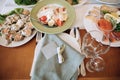 Festive served table with wooden table on wedding party