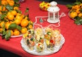 Festive serving table with salads and fruits Royalty Free Stock Photo