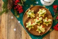 Festive snack of canapes on the Christmas table. Fruit canapes with cheese, kiwi and pineapple. Top view flat lay background. Copy Royalty Free Stock Photo