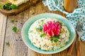 Festive snack on Easter table. Salad with Rice, Onion, Egg, Corn and Mushrooms Royalty Free Stock Photo