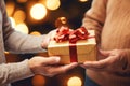 In the festive spirit of Christmas and New Year, a couple holds a gift box