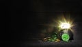 Festive St Patrick`s Day background with a pot of sparkling gold and green coins