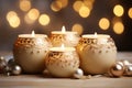 Festive still life with burning candles and Christmas decorations on bokeh background. Christmas composition for home interior