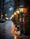 Festive street lamp wrapped in green and red Christmas lights, snowflakes falling, quaint town setting Royalty Free Stock Photo