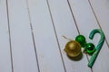 Festive sweetness, gold and green Christmas tree toys Royalty Free Stock Photo