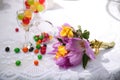 A festive table decorated with birthday cake with flowers and sweets. Royalty Free Stock Photo