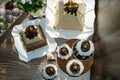 Estive table for Easter. A lot of Easter cakes from curd dough decorated with chocolate and chocolate quail eggs, curd Easter, Royalty Free Stock Photo