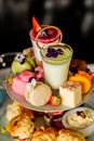 Festive table full of different appetizing desserts in the restaurant