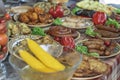 Festive table with grilled meat products and potato, decorated with red pepper and rabbit look tasty and tempting. Slashing dinner Royalty Free Stock Photo