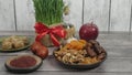 Festive table in honor of Navruz. Wheat with a red ribbon, the traditional holiday of the vernal equinox Nawruz