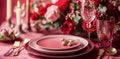Festive table setting with cutlery, candles and beautiful red flowers in vase Royalty Free Stock Photo