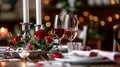 Festive table setting with cutlery, candles and beautiful red flowers in vase Royalty Free Stock Photo