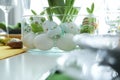 Festive table setting with Easter decorative eggs in bowl