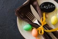 Festive table setting for holiday Easter dinner on dark table Royalty Free Stock Photo
