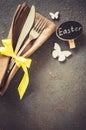 Festive table setting for holiday Easter dinner on dark table Royalty Free Stock Photo