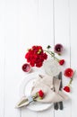 Festive table setting with red roses Royalty Free Stock Photo