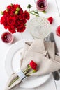 Festive table setting with red roses Royalty Free Stock Photo