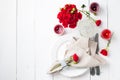 Festive table setting with red roses Royalty Free Stock Photo