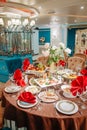 festive tables in the restaurant with red napkins. Table setting Royalty Free Stock Photo