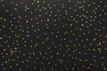 Festive Texture With Golden stars on black background Royalty Free Stock Photo