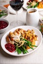 Festive Thankgiving dinner table with plates of food Royalty Free Stock Photo