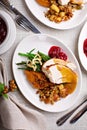 Festive Thankgiving dinner table with plates of food Royalty Free Stock Photo