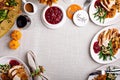 Festive Thankgiving dinner table with plates of food Royalty Free Stock Photo