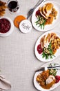 Festive Thankgiving dinner table with plates of food Royalty Free Stock Photo