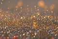 Festive twinkle glitters background, abstract sparkle backdrop with sparkling glimmers yellow, gold, and red backdrop glittering Royalty Free Stock Photo