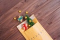 Festive Unboxing: Top View of Wooden Table with Parcels and Decorations