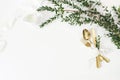 Festive wedding, birthday table setting with golden cutlery, eucalyptus parvifolia, silk ribbon and milk pitcher on