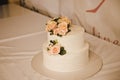 Festive wedding cake with flowers, pink-orange flowers, bunk, beautiful