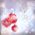 Festive winter background with red holiday balls against bokeh lights and frame of hoarfrost leaves Royalty Free Stock Photo