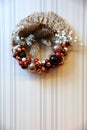 A festive wreath of Christmas baubles as a decoration for Christmas