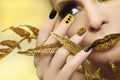 Festive yellow black manicure and makeup . Royalty Free Stock Photo