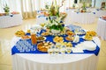Festively laid tables at the Banquet. Various delicacies, snacks and drinks. Catering