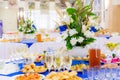 Festively laid tables at the Banquet. Various delicacies, snacks and drinks. Catering Royalty Free Stock Photo