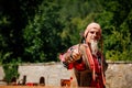 Festivities of Pernstejn Manor, medieval fair, executioner with wooden shackles, man in historical costume, Reconstruction,