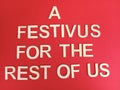 A festivus for the rest of us message on a festive red background