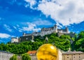 the festung Hohensalzburg fortress with the Sphaera sculpture situated on the Kapitelplatz in the central Salzburg Royalty Free Stock Photo