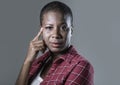 Lifestyle isolated portrait of young attractive and sad black afro American woman feeling unwell and depressed and suffering pain Royalty Free Stock Photo