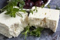 Feta Cheese with Black Olives and Fresh Herbs Royalty Free Stock Photo