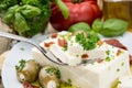 Feta Cheese blocks on a fork Royalty Free Stock Photo